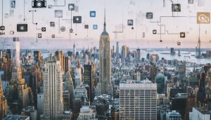 A digital collage showcasing New York City's skyline with symbols of virtual connectivity, including Zoom and Discord icons, and photographers using various devices, representing the virtual photography community.