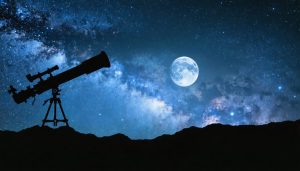 Artistic visualization of a telescope aimed at an expansive night sky filled with stars, a glowing moon, and a bright planet, representing the journey from beginner astrophotography to capturing deep-sky wonders.