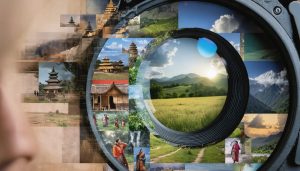 A conceptual image of a camera lens acting as a portal, displaying diverse cultural symbols, landscapes, and people, highlighting the theme of cultural perspectives in photography.