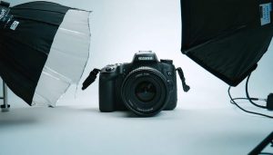 "Professional-grade DSLR camera with macro lens and ring light on a photography setup designed for quality control in manufacturing."