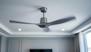 Eye-level close-up of a spinning ceiling fan with blades appearing bent and diagonal from rolling shutter, lit by soft window light, with a blurred modern ceiling and recessed lights in the background.